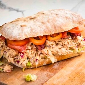 Ciabatta sandwich with chicken, bacon, and fresh vegetables from Casa Bake.