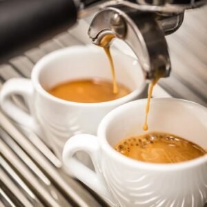 Expresso coffee brewing into a white cup, Casa Bake coffee product.