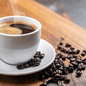 Americano coffee in a white cup with coffee beans, Casa Bake coffee selection.